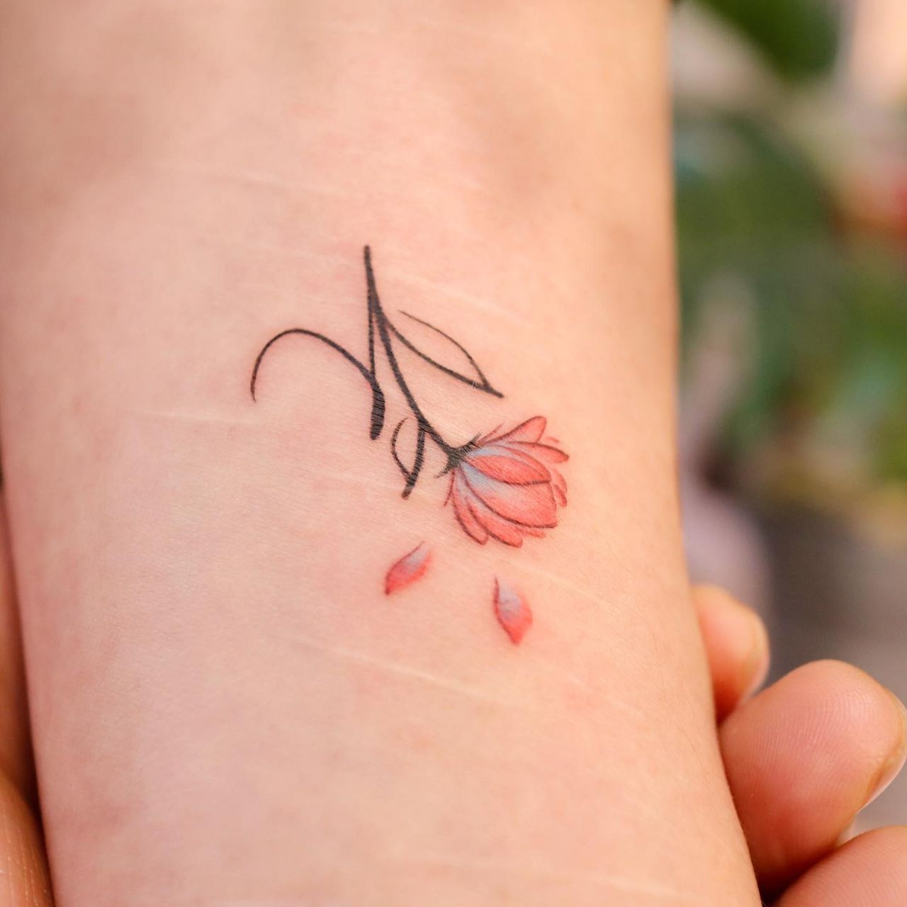 Colorful Floral Wrist Tattoo